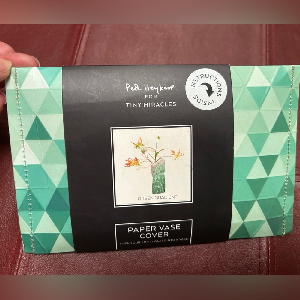 Transform any empty bottle into vase w/Geometric Paper Vase Cover. Coated paper.